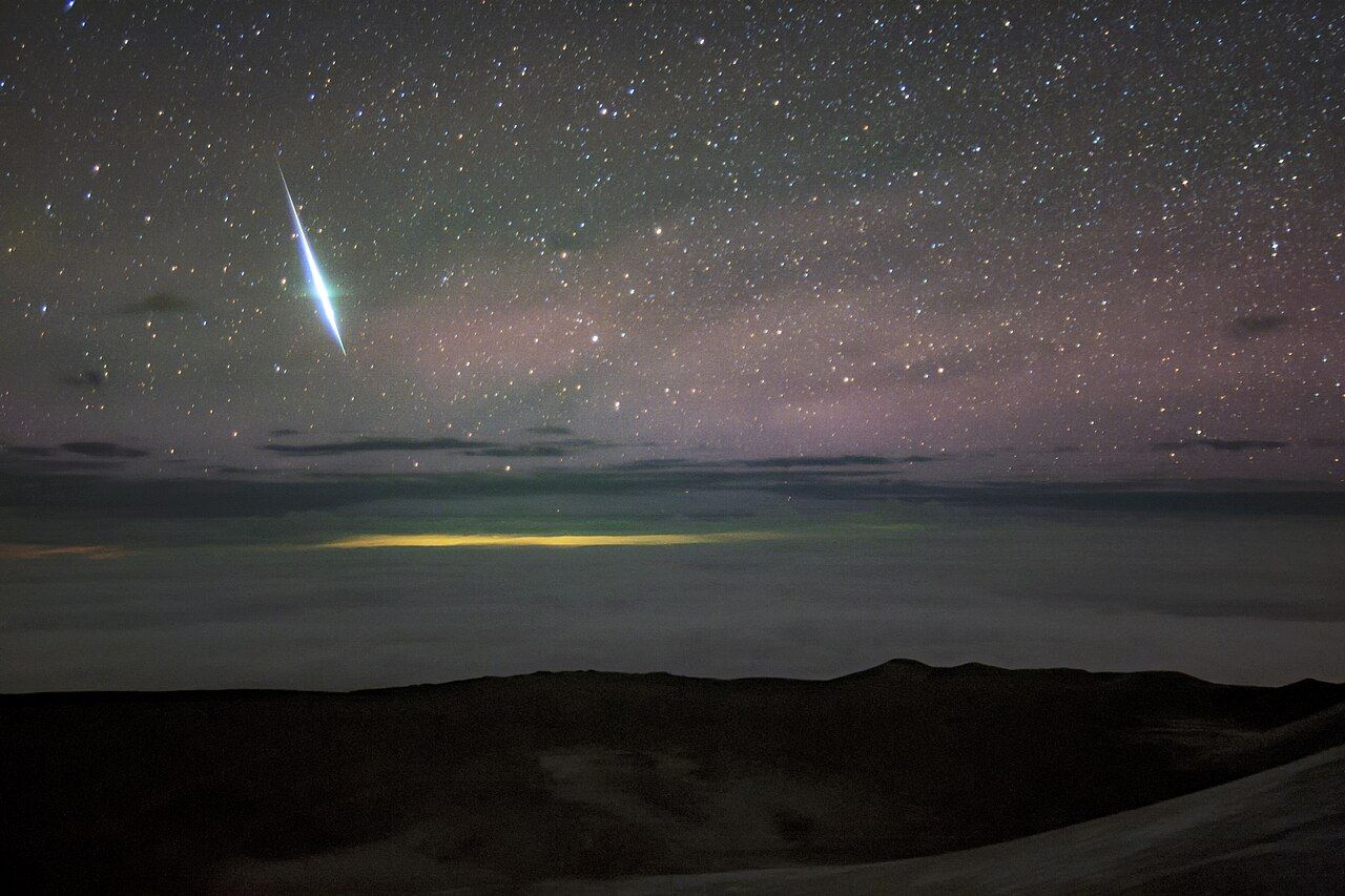 A brilliant Geminid fireball over Gemini North on Maunakea o